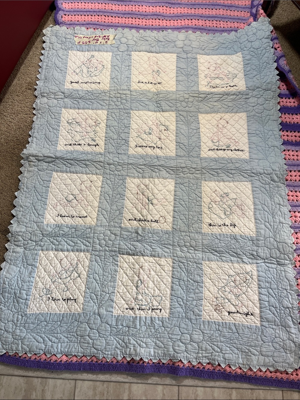 Light Blue Patchwork Quilt with White Appliqué Squares